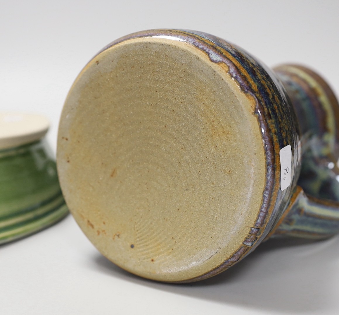 A Joe Finch (British b.1947) lustre jug, together with an Arwyn Jones eye shaped dish, and a Marcus Finch Raku bowl, tallest 16.5cm (3)